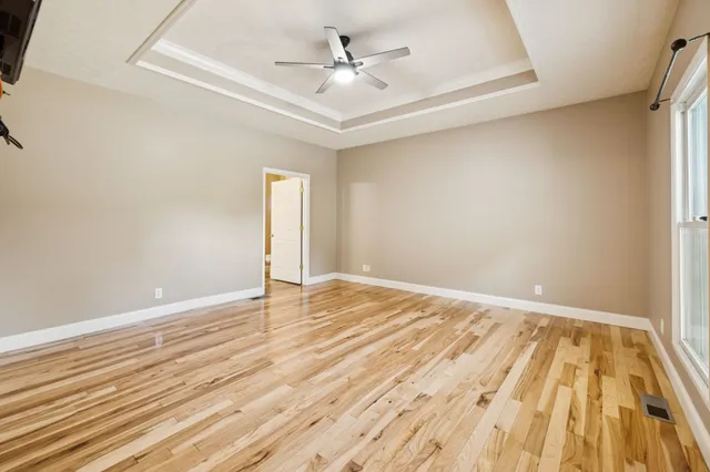 a view of a livingroom with wooden floor