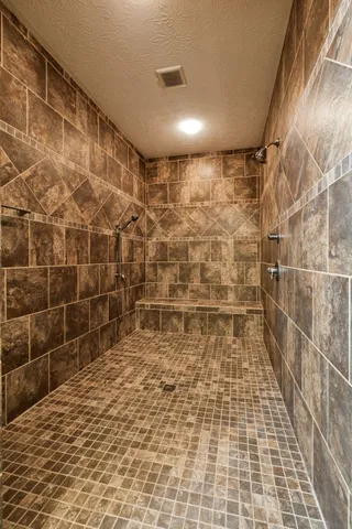 a kitchen with granite countertop a sink and cabinets