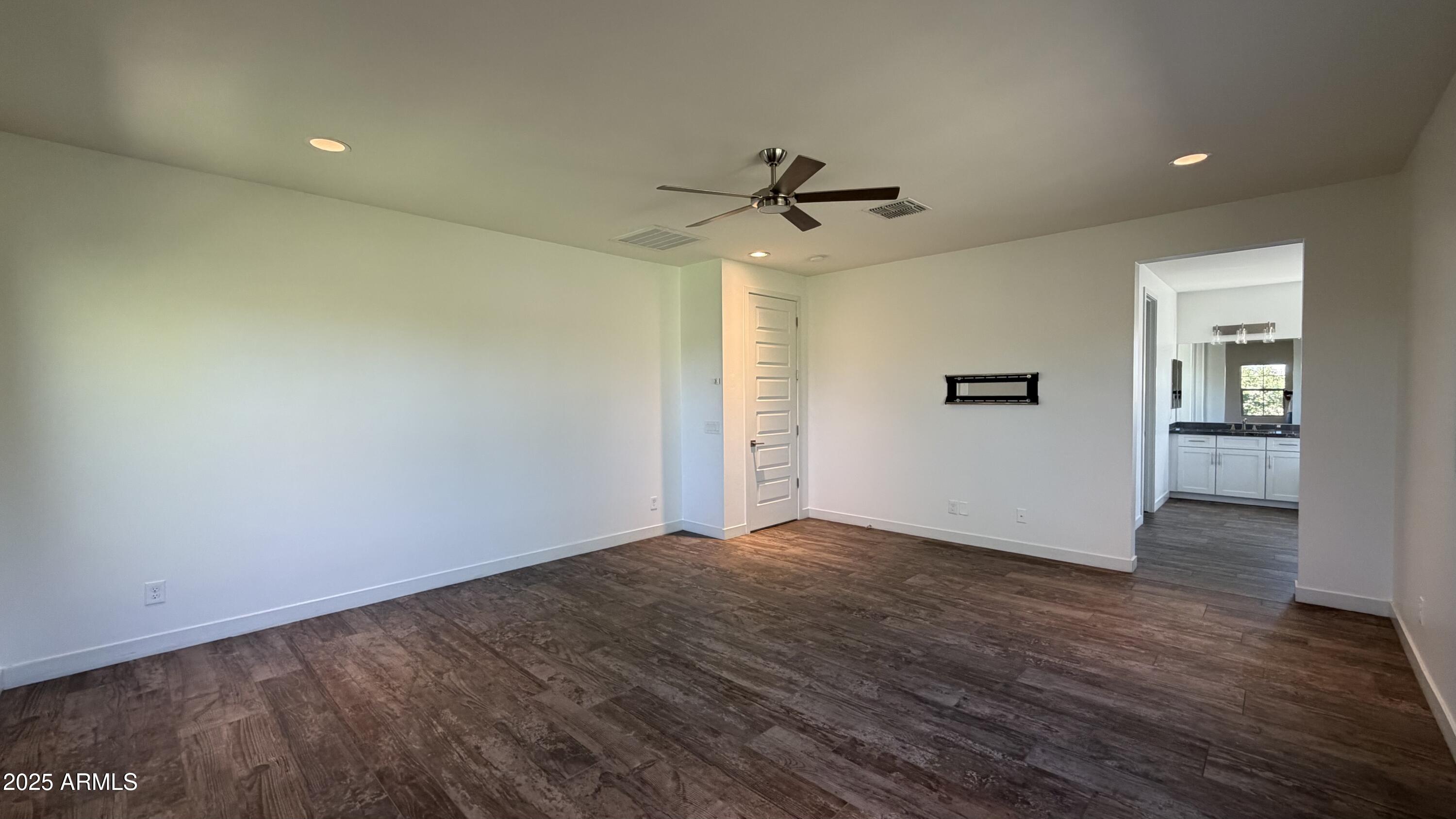 4536 East Walter Way Phoenix, AZ 85050 - Photo 22 of 50 wooden floor in an empty room with a window