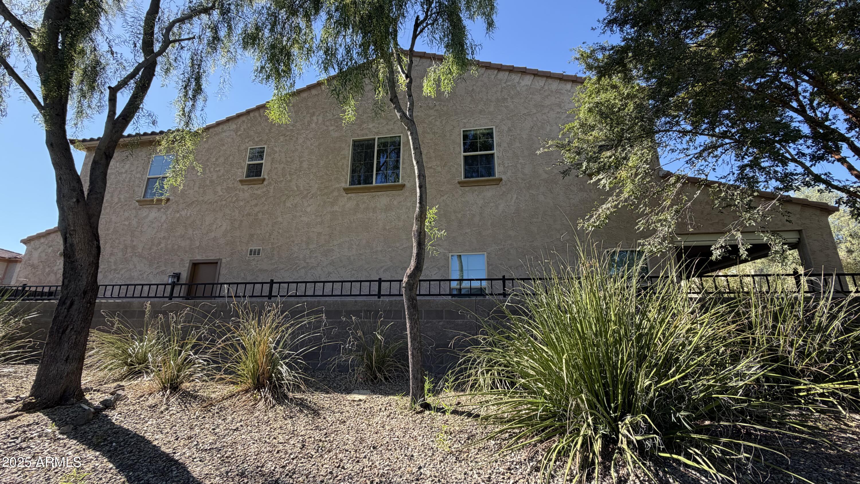 4536 East Walter Way Phoenix, AZ 85050 - Photo 4 of 50 a view of a back yard of the house