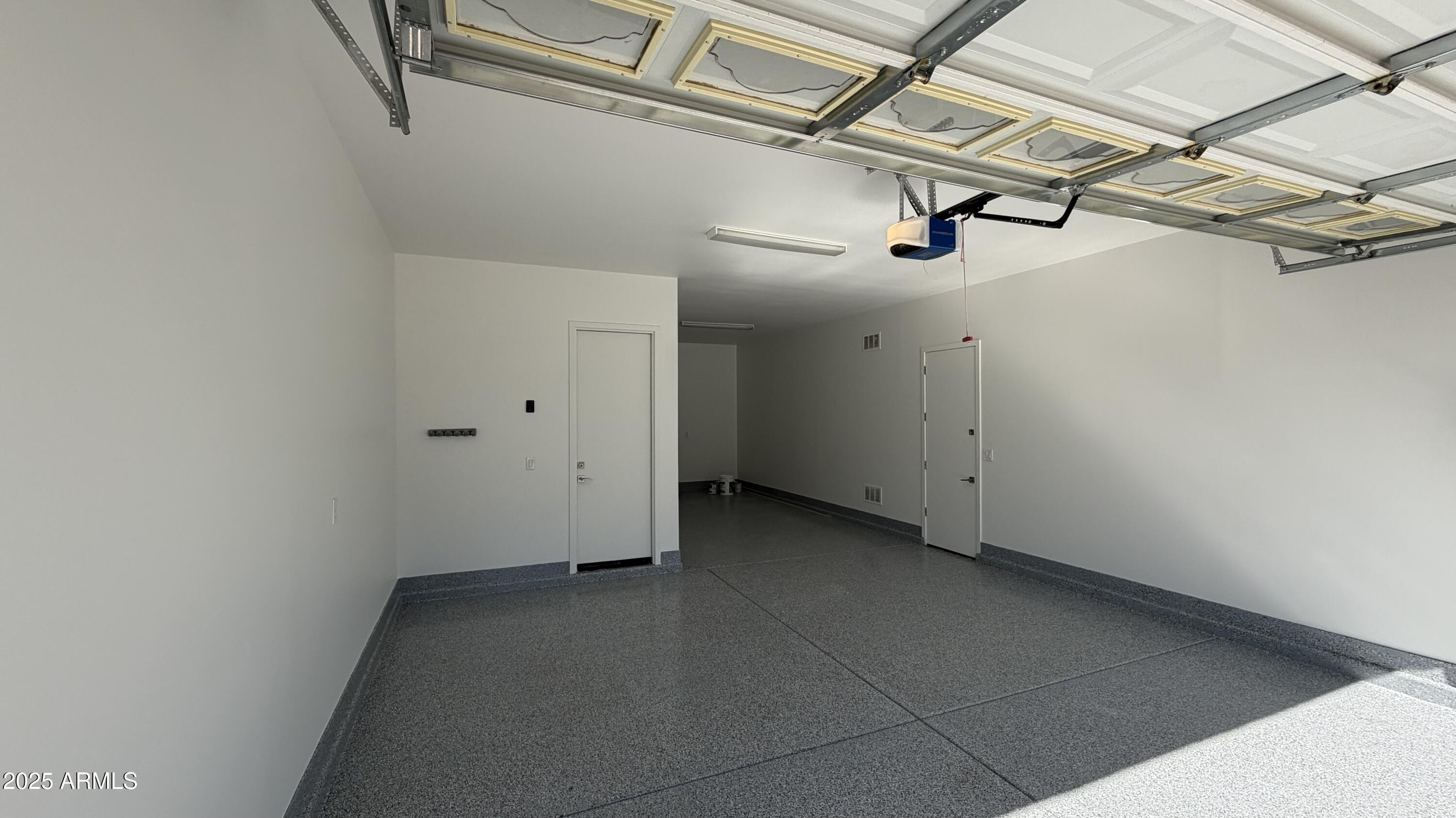 4536 East Walter Way Phoenix, AZ 85050 - Photo 43 of 50 a view of a room with racks on the wall