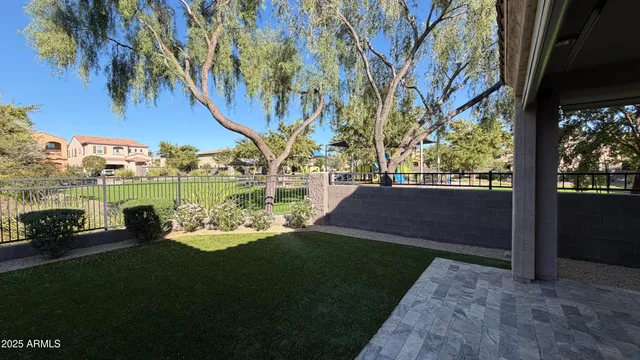 a view of yard with patio