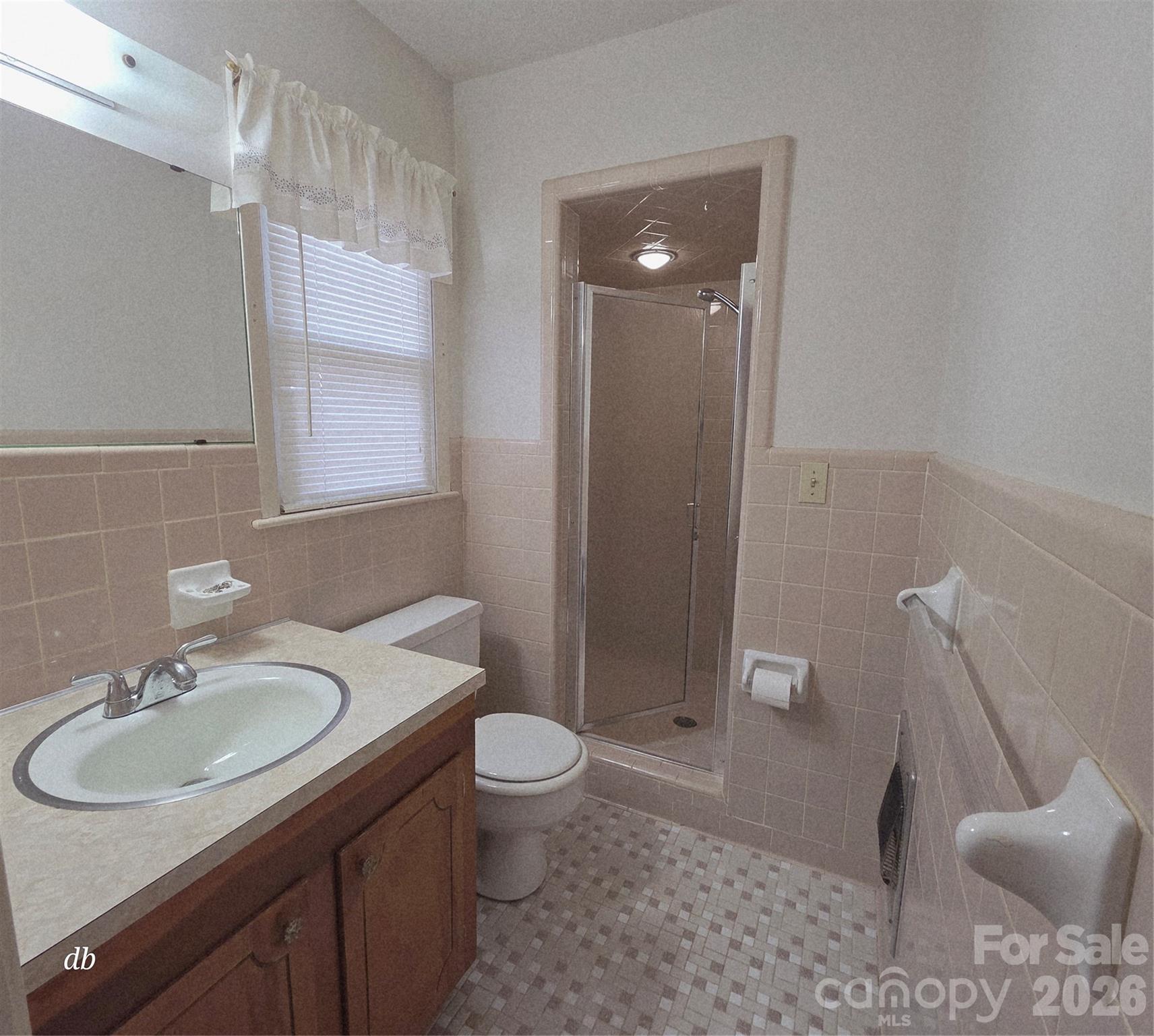 1133 Earl Road, Unit 7982 Shelby, NC 28152 - Photo 11 of 17 a bathroom with a sink toilet and shower