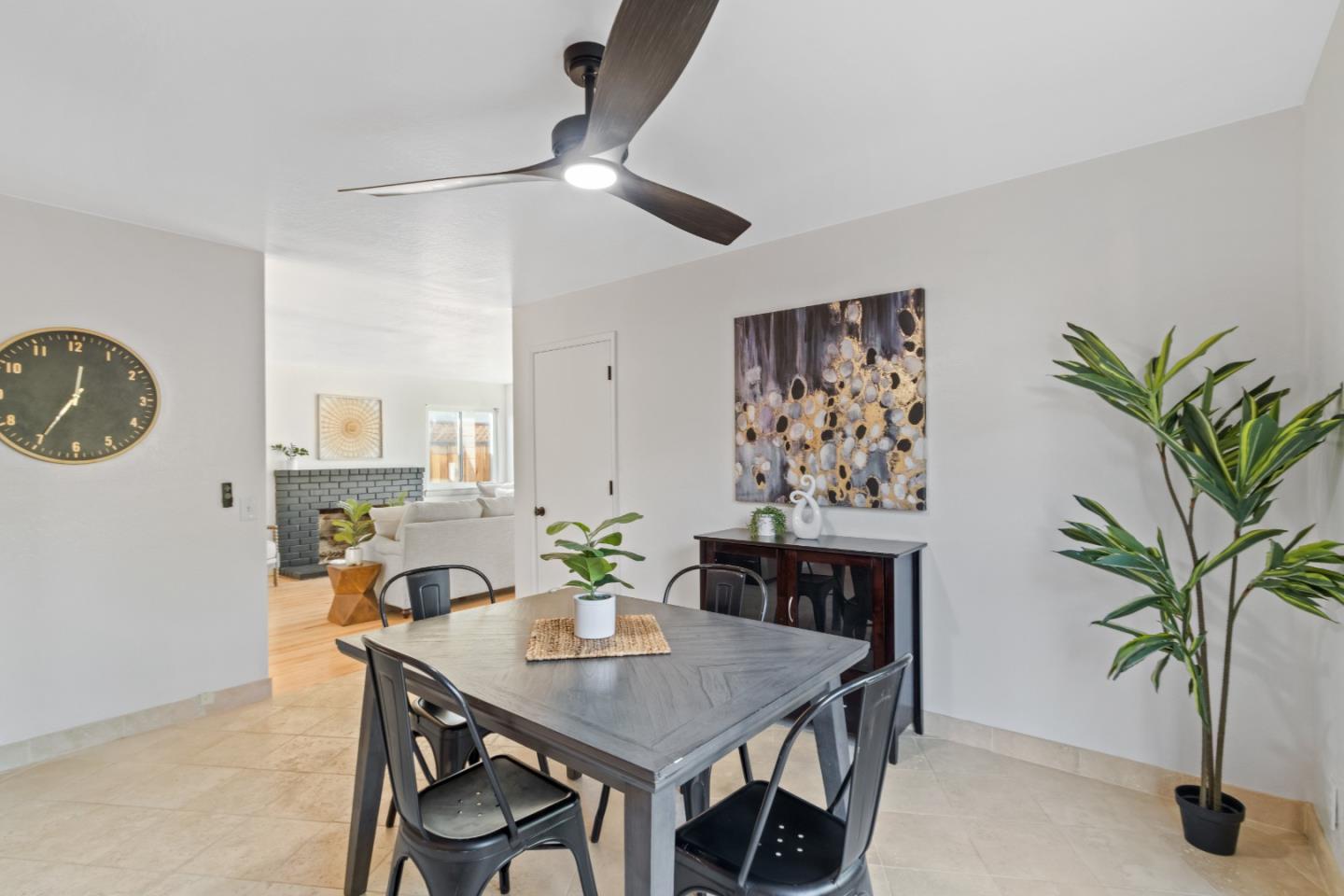 4770 Opal Street Capitola, CA 95010 - Photo 17 of 48 a view of a dining room with furniture and a potted plant