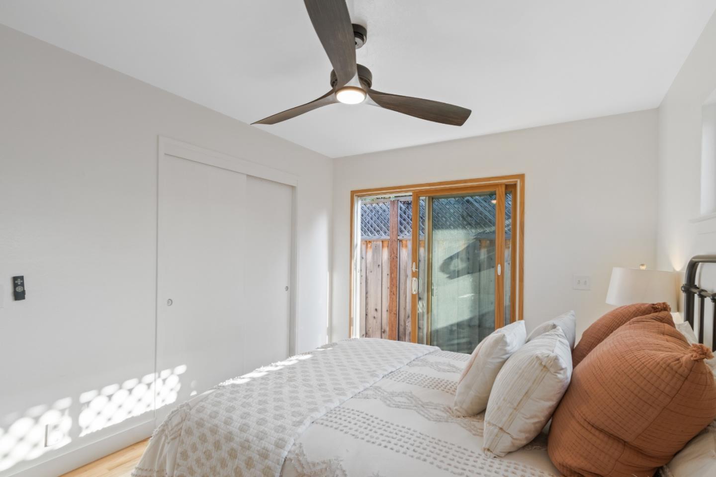 4770 Opal Street Capitola, CA 95010 - Photo 18 of 48 a bedroom with a bed and a window