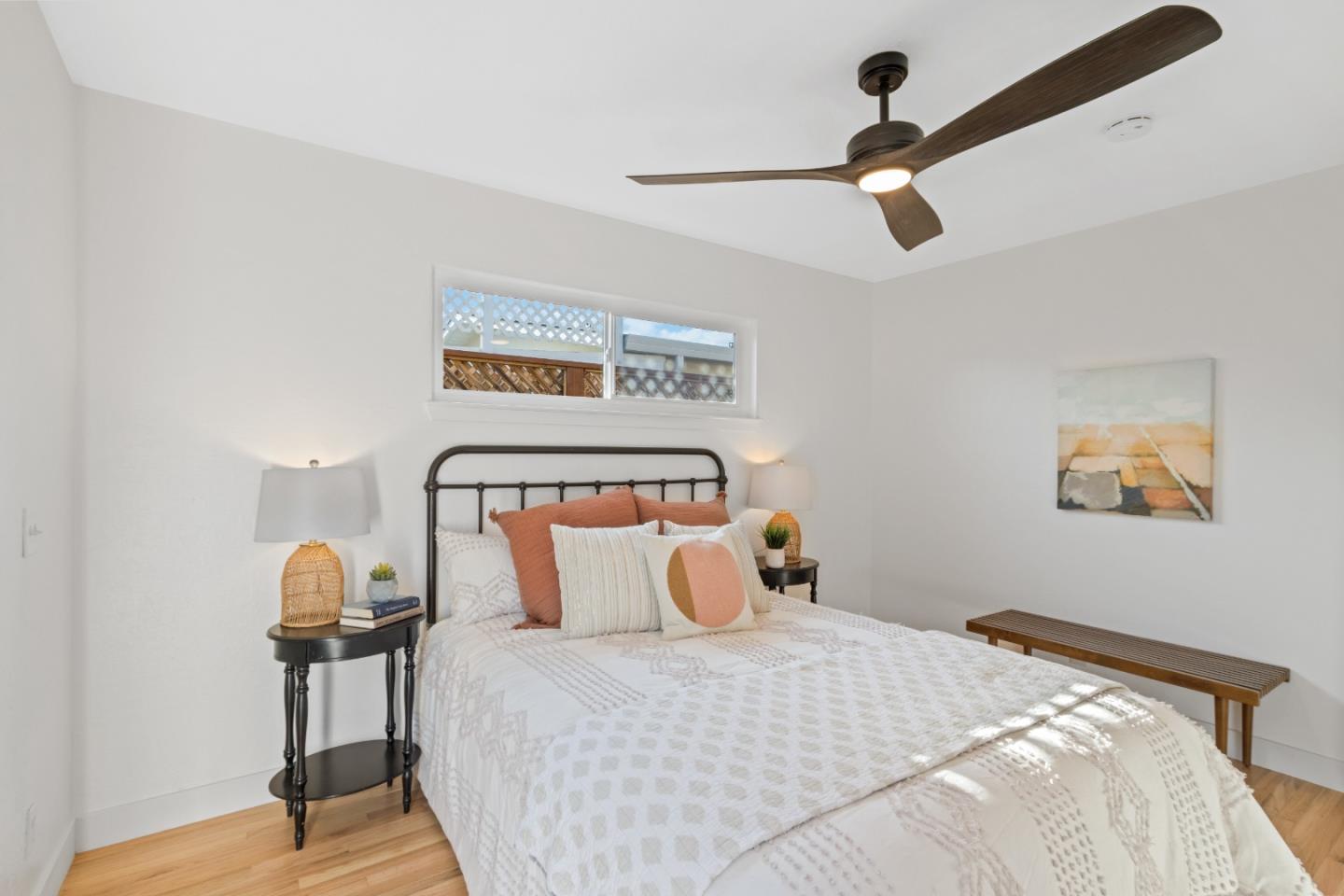 4770 Opal Street Capitola, CA 95010 - Photo 19 of 48 a bedroom with a bed and window