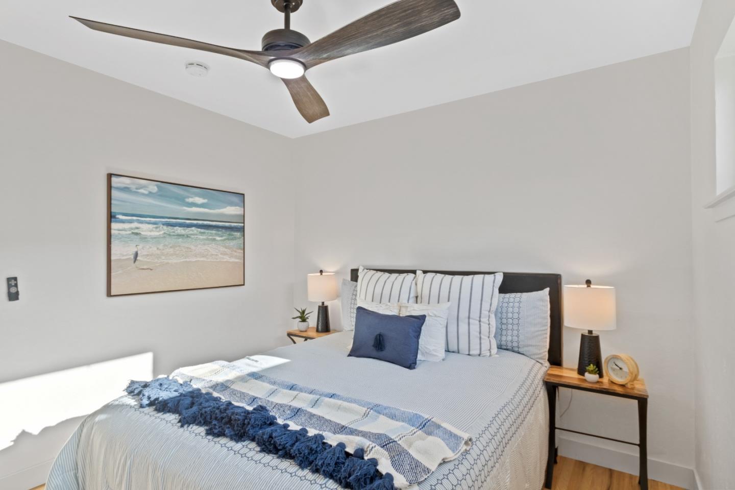 4770 Opal Street Capitola, CA 95010 - Photo 21 of 48 a bedroom with a bed and dresser