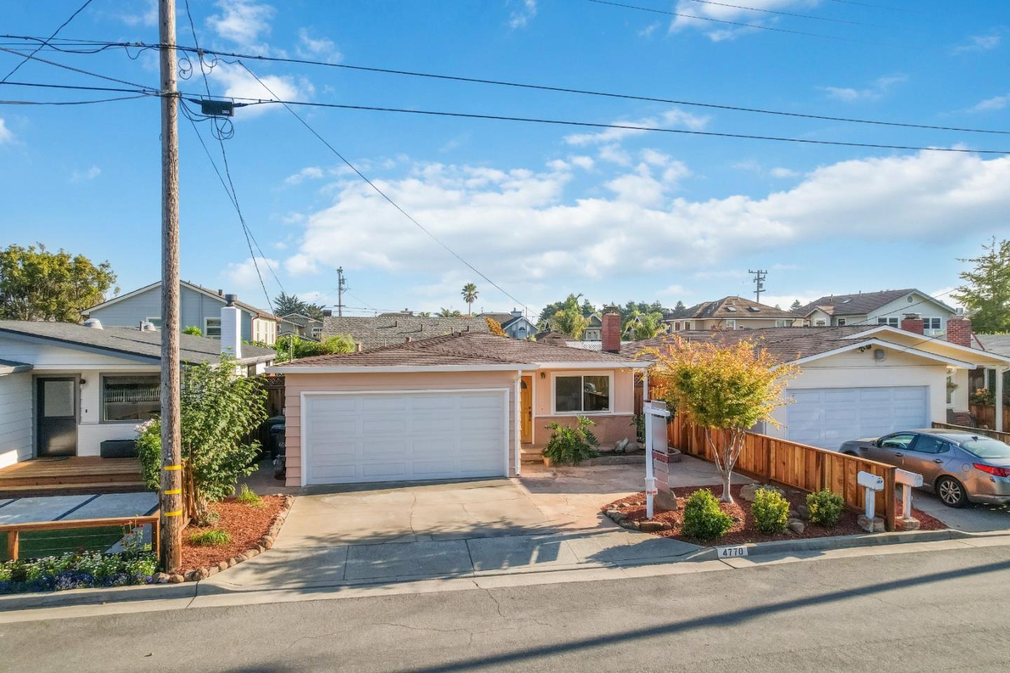 4770 Opal Street Capitola, CA 95010 - Photo 24 of 48 a view of a city from a balcony