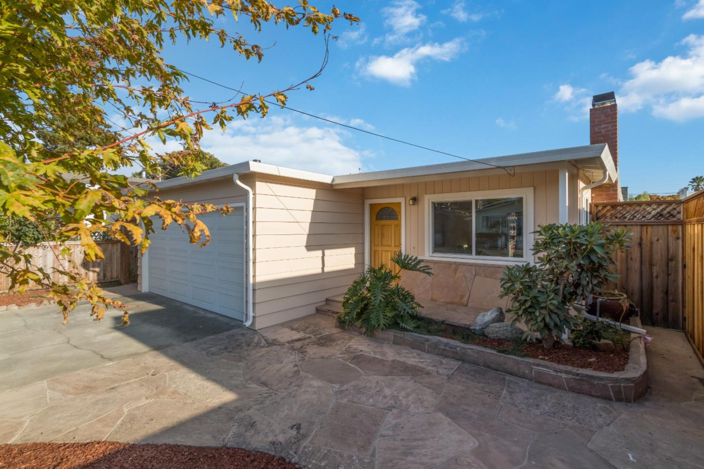 4770 Opal Street Capitola, CA 95010 - Photo 26 of 48 a front view of a house with garden