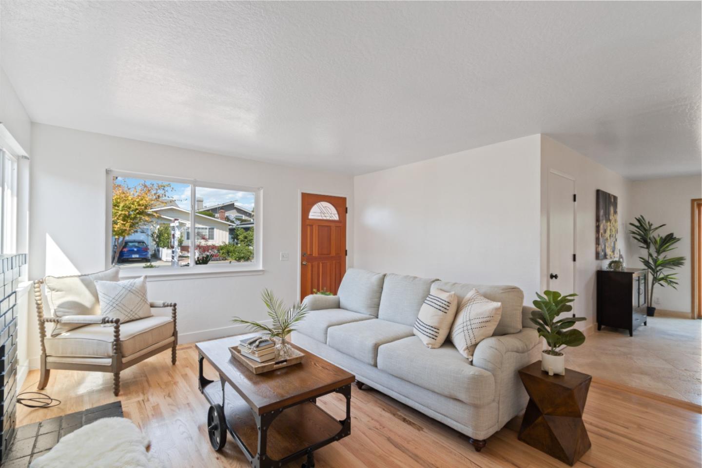 4770 Opal Street Capitola, CA 95010 - Photo 3 of 48 a living room with furniture and a wooden floor