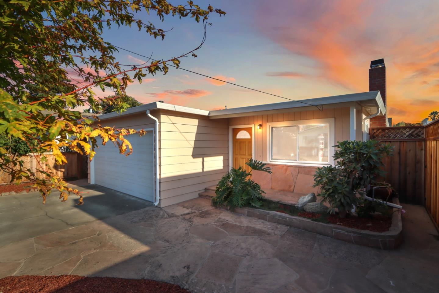 4770 Opal Street Capitola, CA 95010 - Photo 45 of 48 a front view of a house with garden