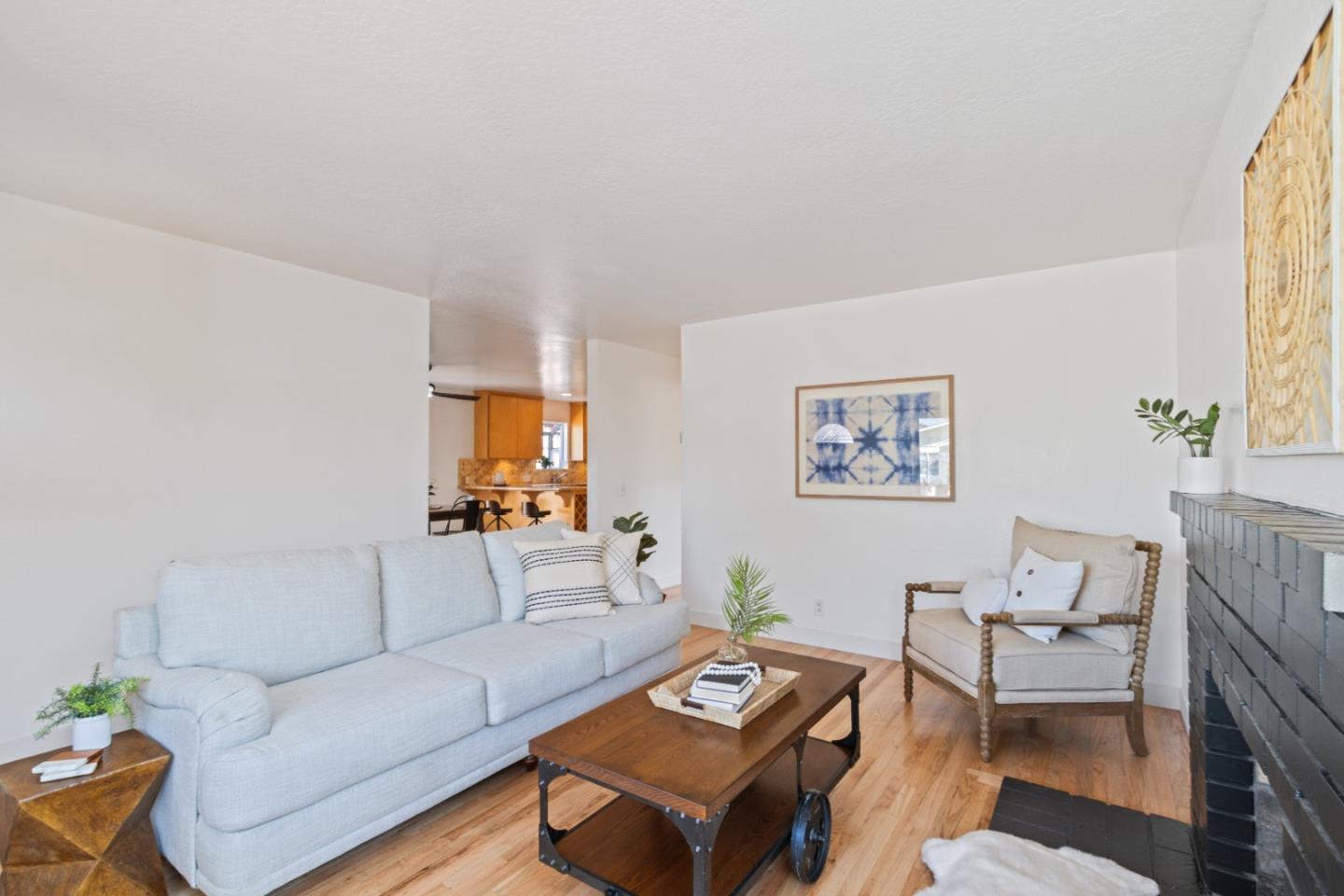 4770 Opal Street Capitola, CA 95010 - Photo 5 of 48 a living room with furniture a rug and a window