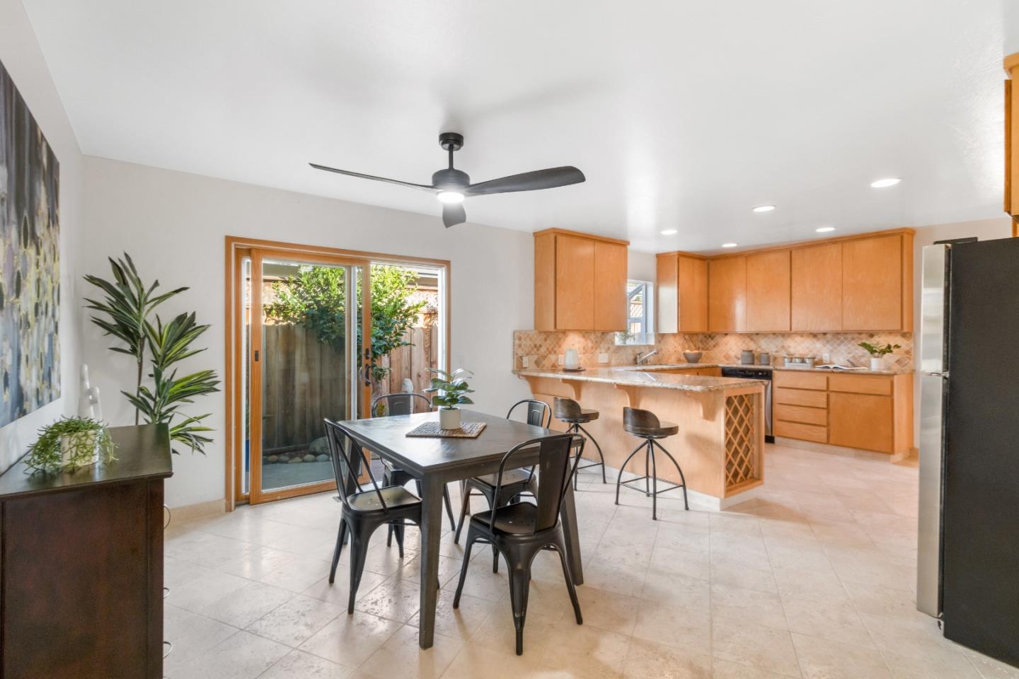 4770 Opal Street Capitola, CA 95010 - Photo 7 of 48 a view of a dining room with furniture window and outside view