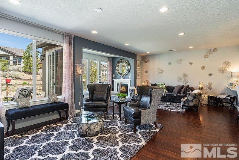 1410 Wakefield Trail Reno, NV 89523 - Photo 8 of 25 a living room with furniture or couch and a large window