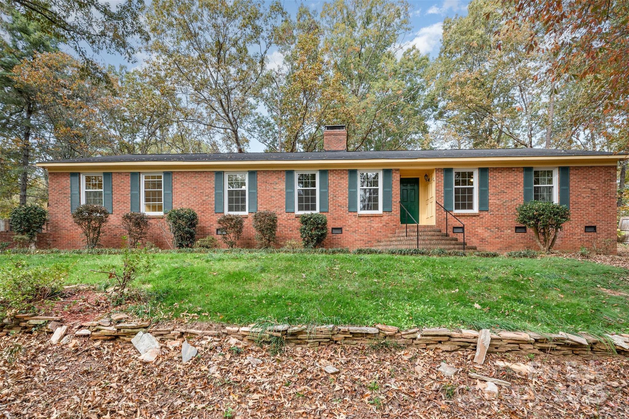 211 Ridgewood Drive Monroe, NC 28112 - Photo 2 of 31 front view of house with a yard