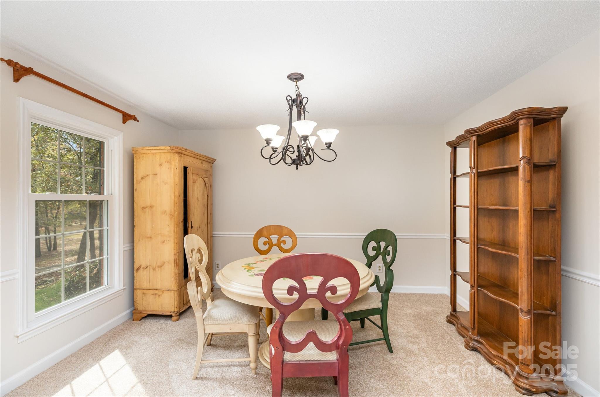 211 Ridgewood Drive Monroe, NC 28112 - Photo 9 of 31 a view of a dining room with furniture window and outside view