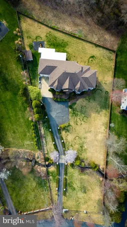 a view of a yard with an outdoor seating