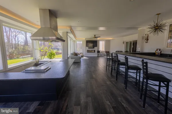 a view of a dining room with furniture and window