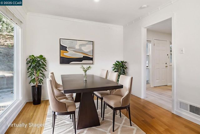 a kitchen with cabinets stainless steel appliances and a sink