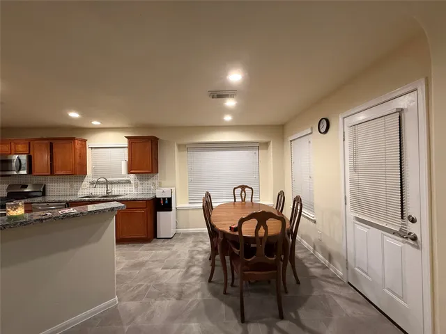 a view of a dining room with furniture