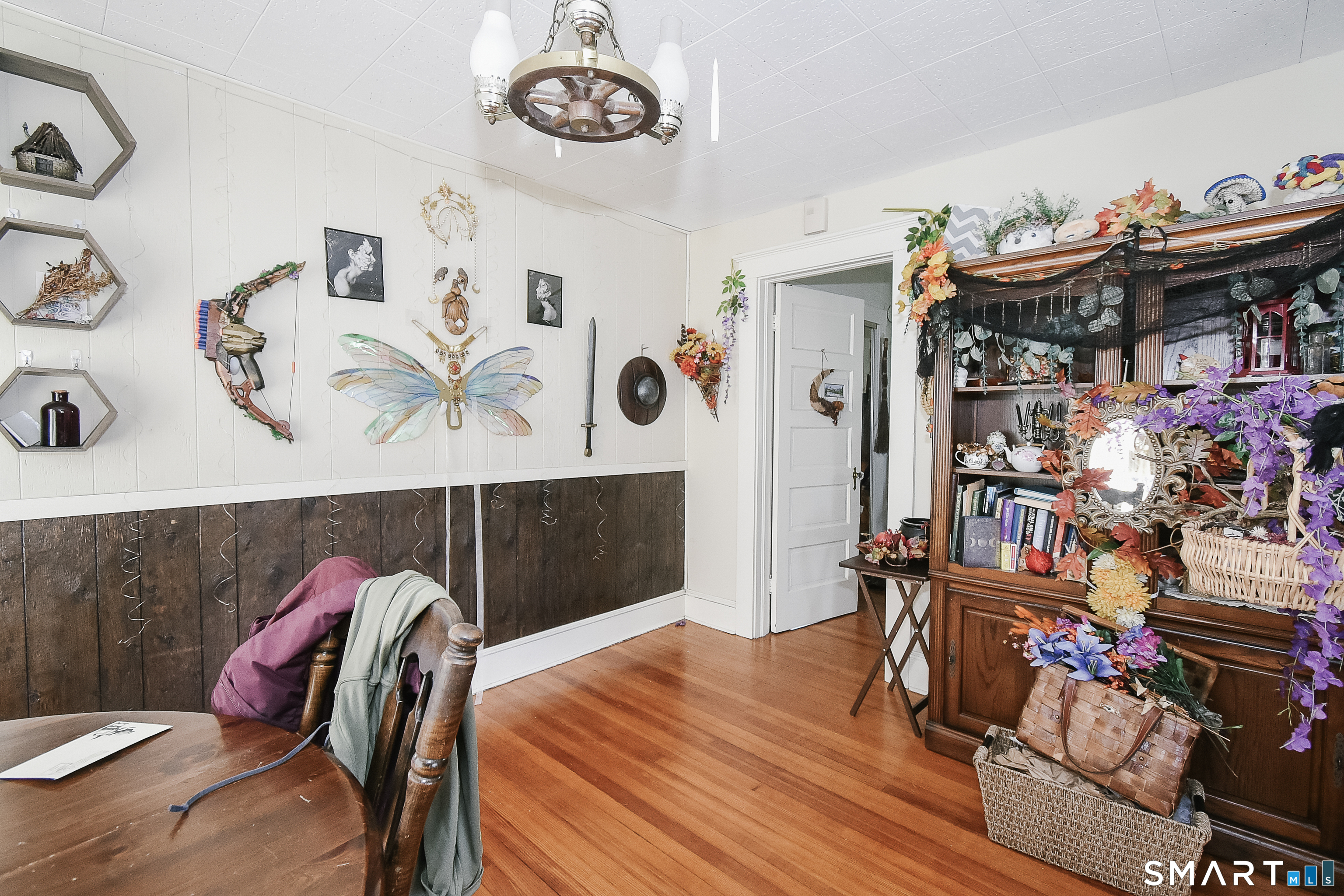 35 School Street Torrington, CT 06790 - Photo 12 of 17 a view of a dining room with furniture and wooden floor