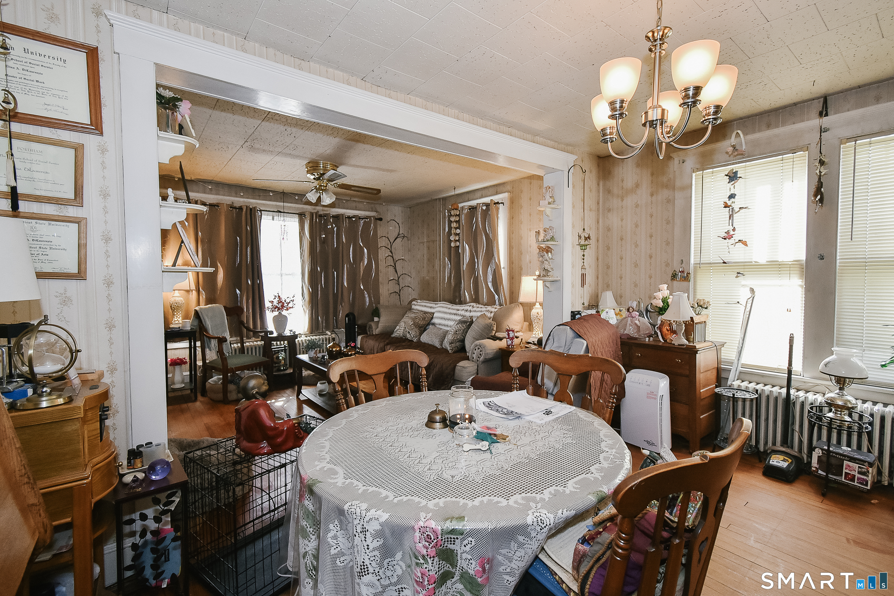 35 School Street Torrington, CT 06790 - Photo 7 of 17 a view of a dining room with furniture and chandelier