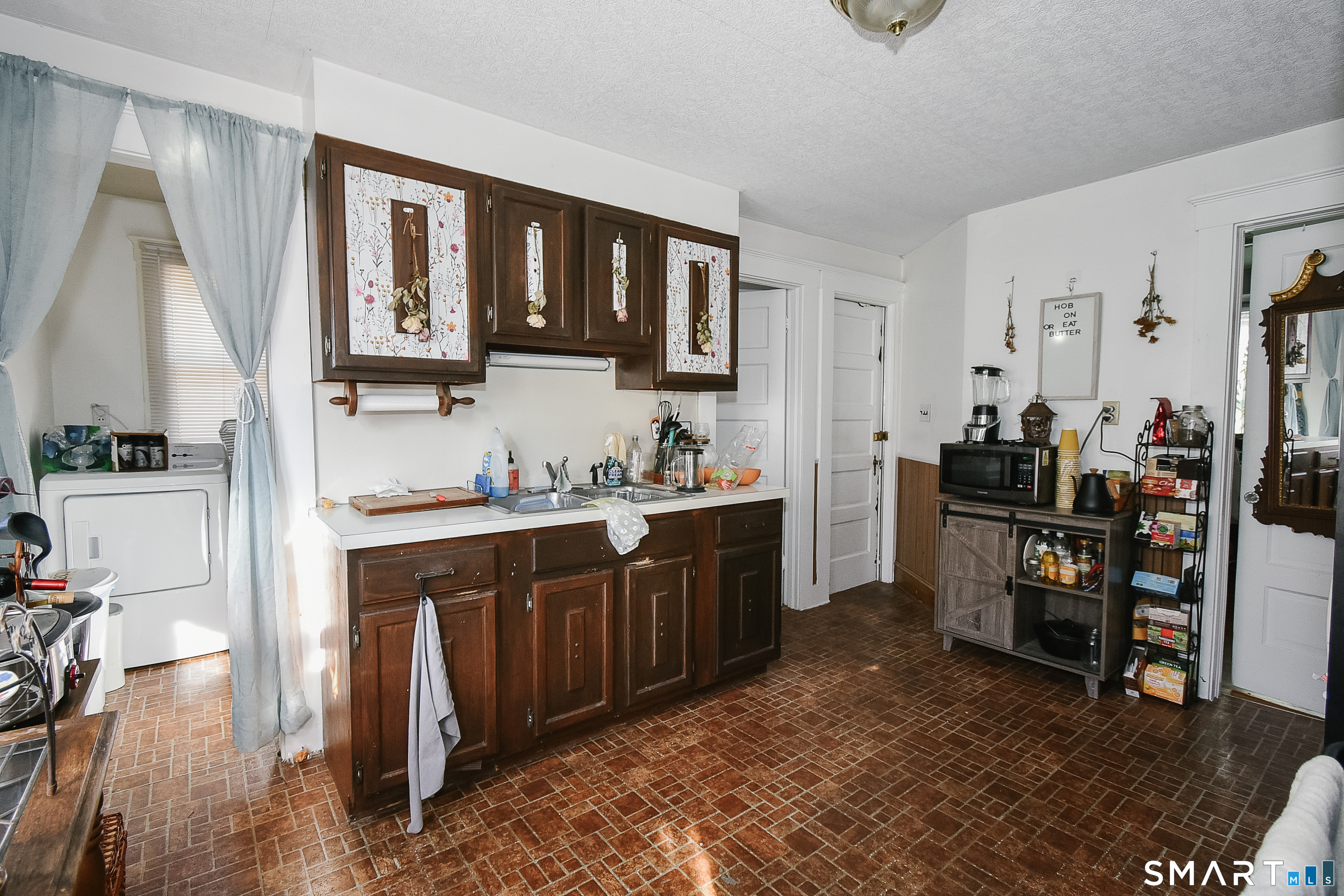 35 School Street Torrington, CT 06790 - Photo 10 of 17 a kitchen with stainless steel appliances granite countertop a refrigerator and stove