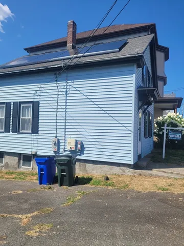 a view of a house with a patio