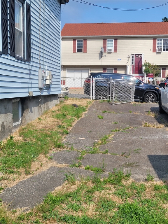 90 Tremont Street Fall River, MA 02720 - Photo 2 of 16 a swimming pool with outdoor seating and yard