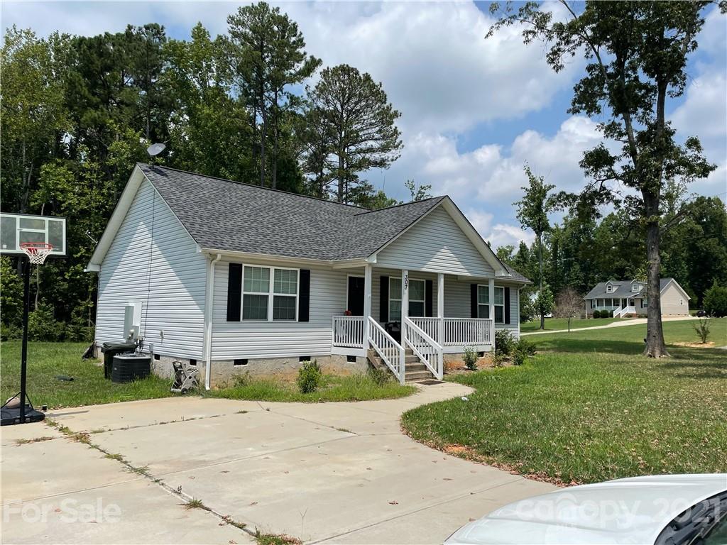 307 Rhea Road, Unit 2 York, SC 29745 - Photo 1 of 2 a front view of house with yard and green space