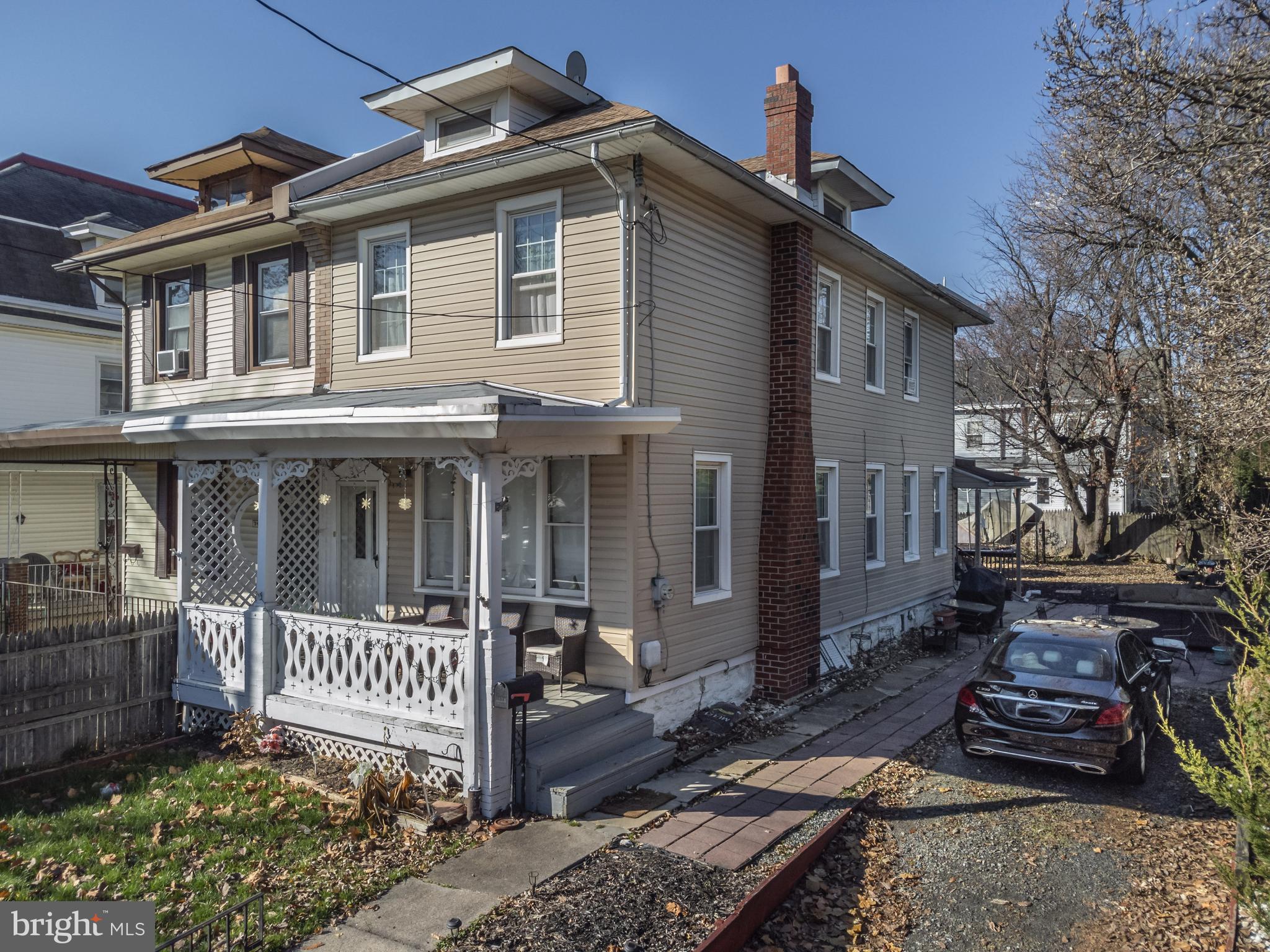 7414 Bingham Street Philadelphia, PA 19111 - Photo 1 of 39 a front view of a house with a porch
