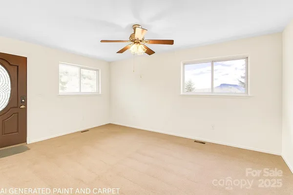 a kitchen with stainless steel appliances kitchen island a refrigerator and a sink