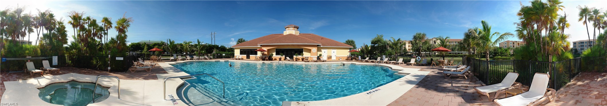 8251 Pathfinder Loop, Unit 624 Fort Myers, FL 33919 - Photo 15 of 15 a view of a house with a yard and potted plants