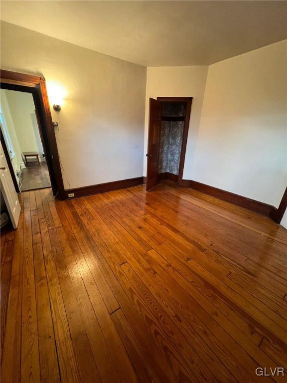 58 South Broad Street, Unit 2 Nazareth, PA 18064 - Photo 2 of 8 a view of an empty room with wooden floor and a window