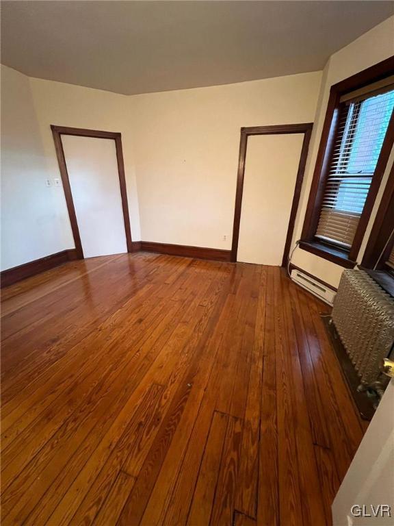 58 South Broad Street, Unit 2 Nazareth, PA 18064 - Photo 3 of 8 a view of an empty room with wooden floor and a window
