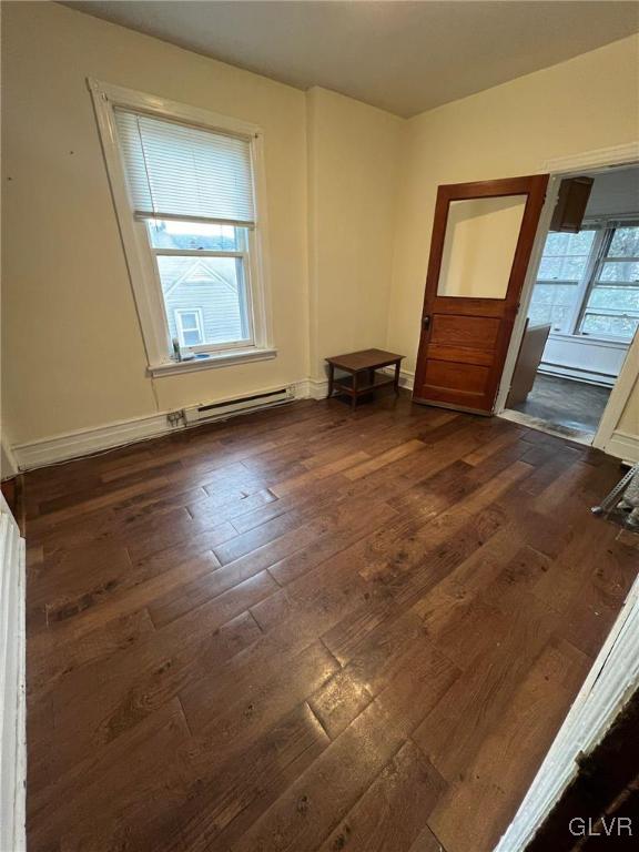 58 South Broad Street, Unit 2 Nazareth, PA 18064 - Photo 6 of 8 a view of an empty room with wooden floor and a window
