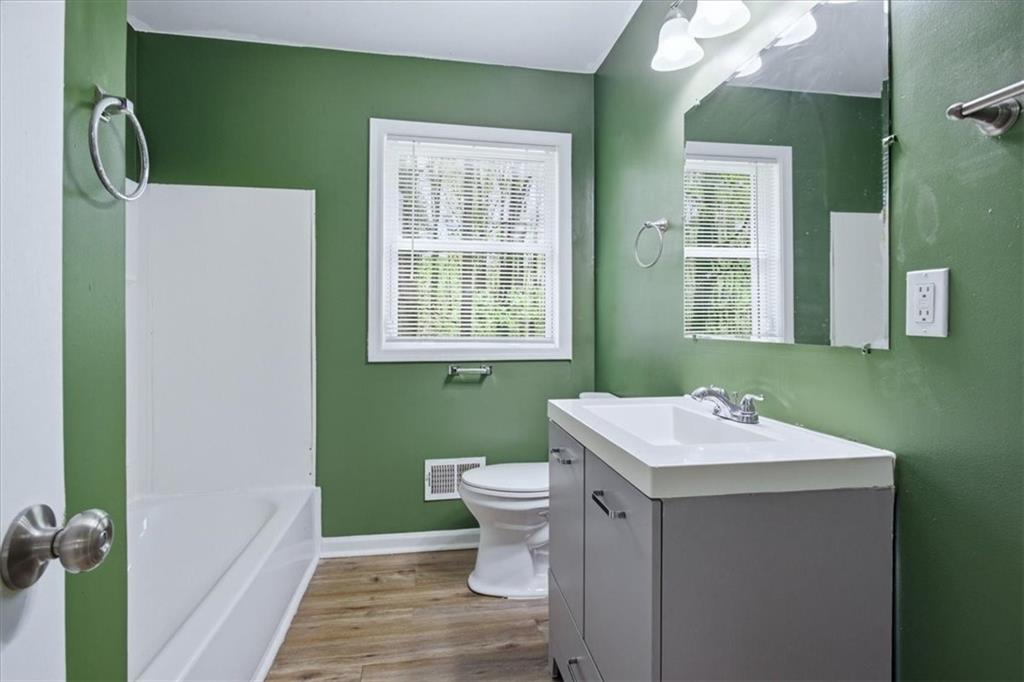 2536 Butner Road Atlanta, GA 30331 - Photo 12 of 42 a bathroom with a sink toilet and mirror