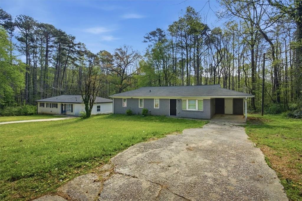 2536 Butner Road Atlanta, GA 30331 - Photo 21 of 42 a view of a house with a yard