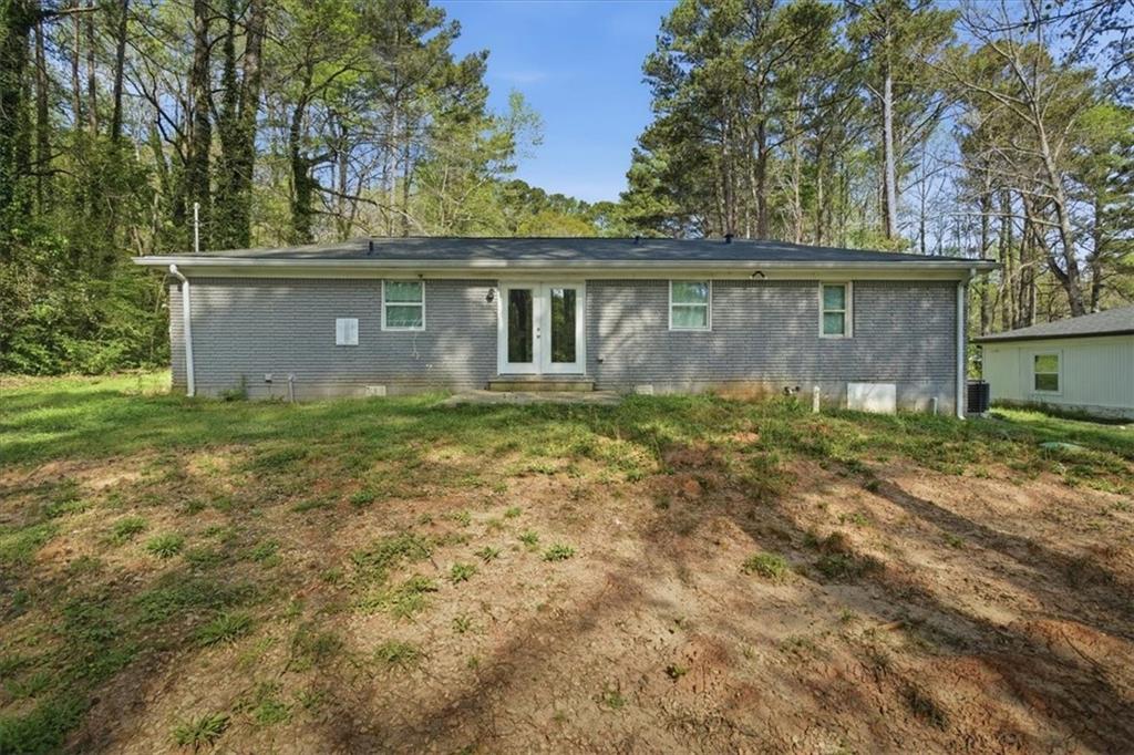 2536 Butner Road Atlanta, GA 30331 - Photo 25 of 42 a view of a house with a yard