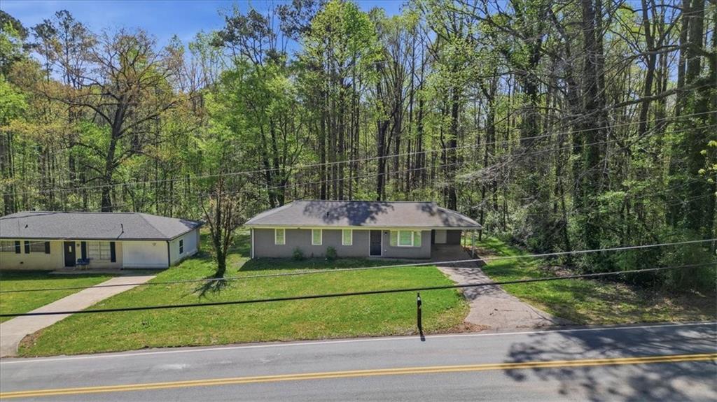 2536 Butner Road Atlanta, GA 30331 - Photo 30 of 42 a front view of a house with garden