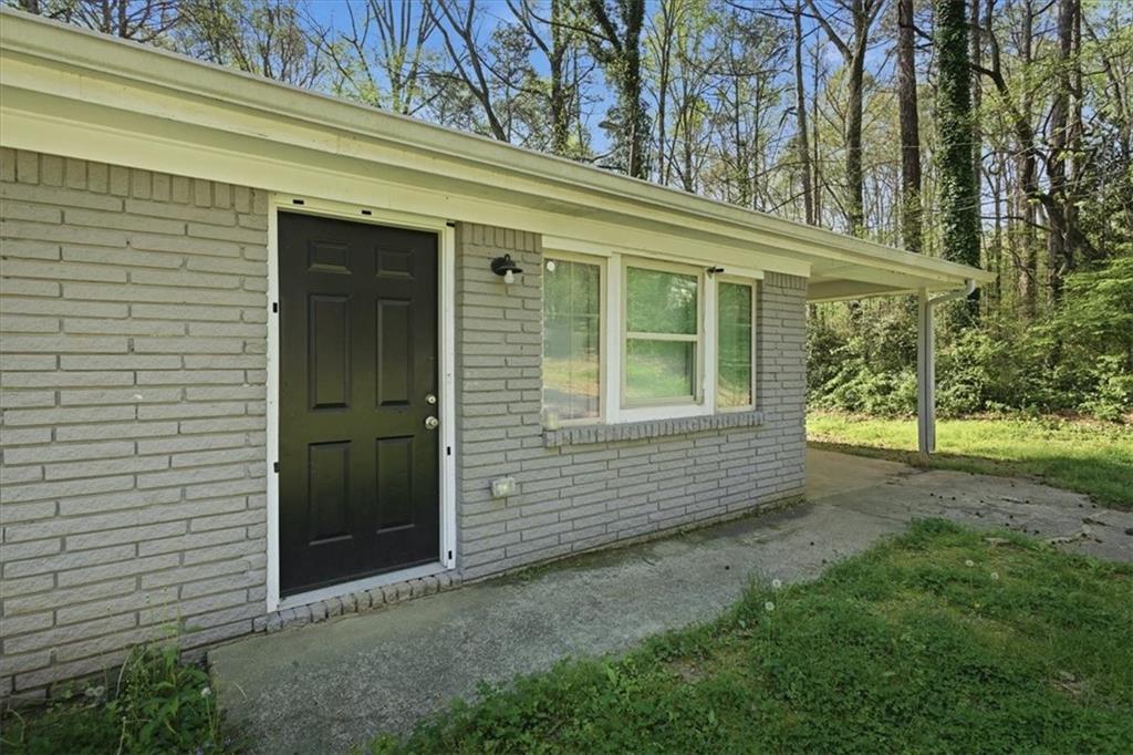 2536 Butner Road Atlanta, GA 30331 - Photo 3 of 42 a view of a house with a yard