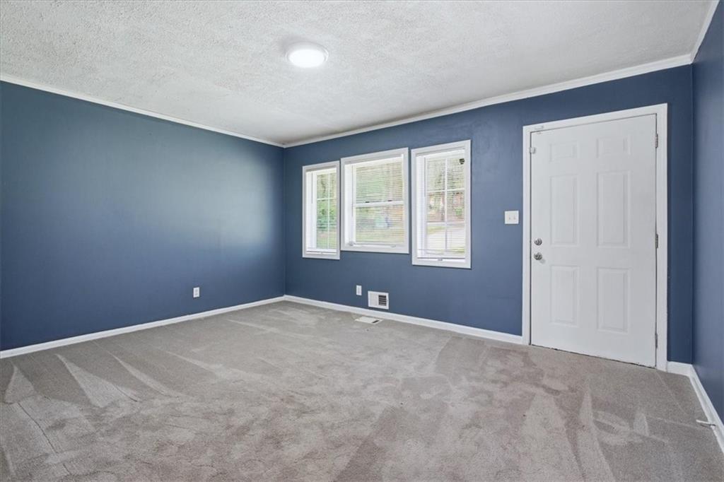 2536 Butner Road Atlanta, GA 30331 - Photo 5 of 42 a view of an empty room with a window