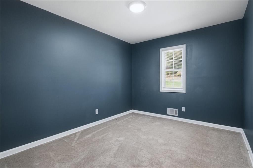 2536 Butner Road Atlanta, GA 30331 - Photo 10 of 42 an empty room with a window