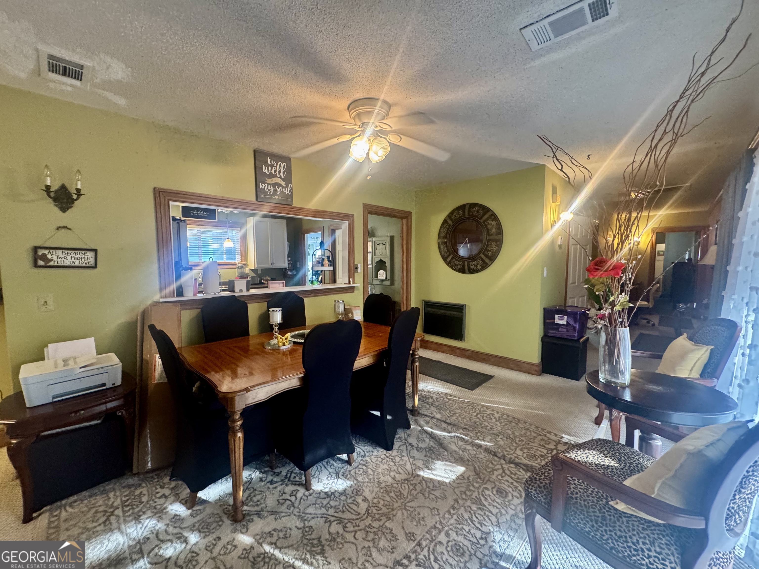 914 Adderton Street Americus, GA 31719 - Photo 19 of 54 a view of a dining room with furniture and wooden floor