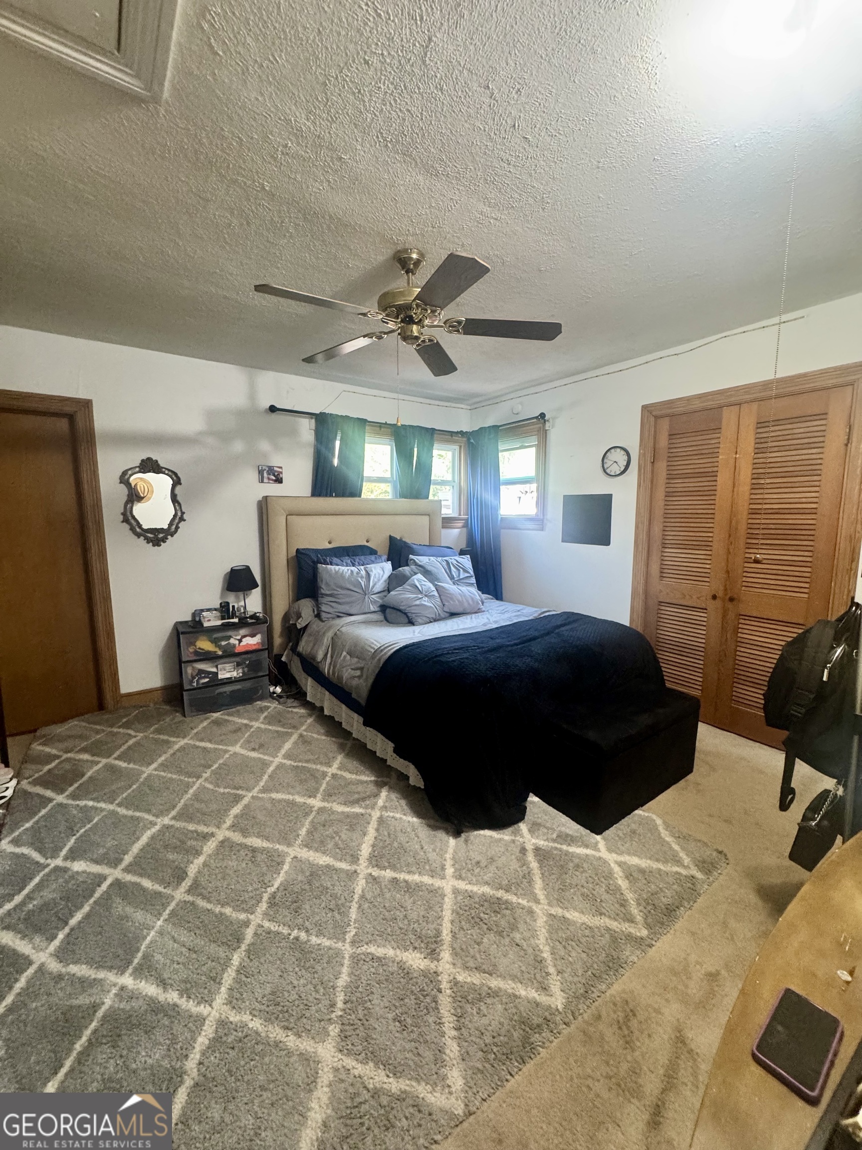 914 Adderton Street Americus, GA 31719 - Photo 21 of 54 a bedroom with a bed and window