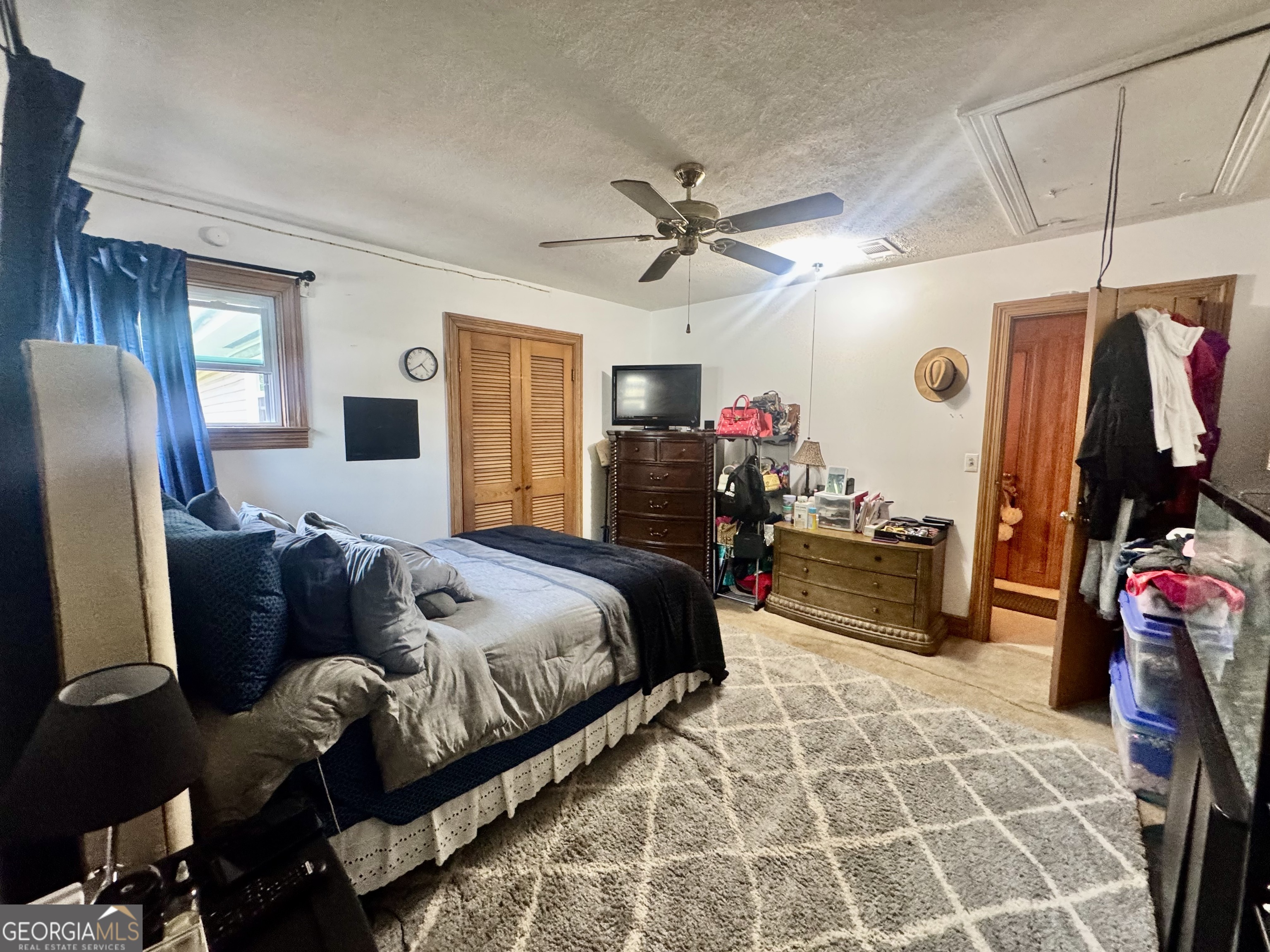 914 Adderton Street Americus, GA 31719 - Photo 23 of 54 a bed room with a bed and furniture