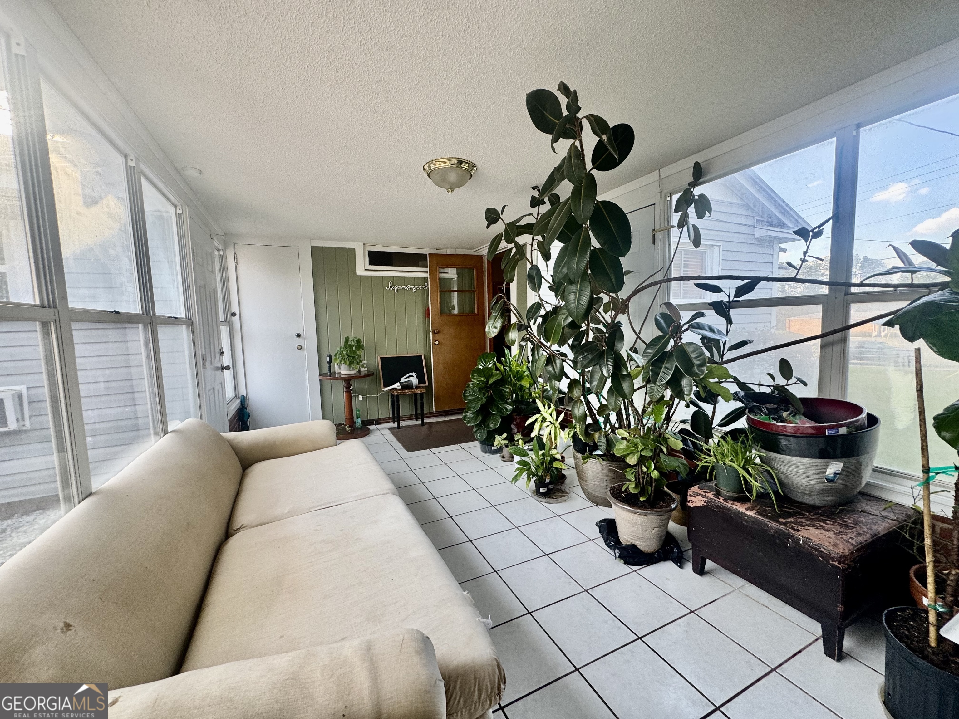 914 Adderton Street Americus, GA 31719 - Photo 39 of 54 a living room filled with furniture