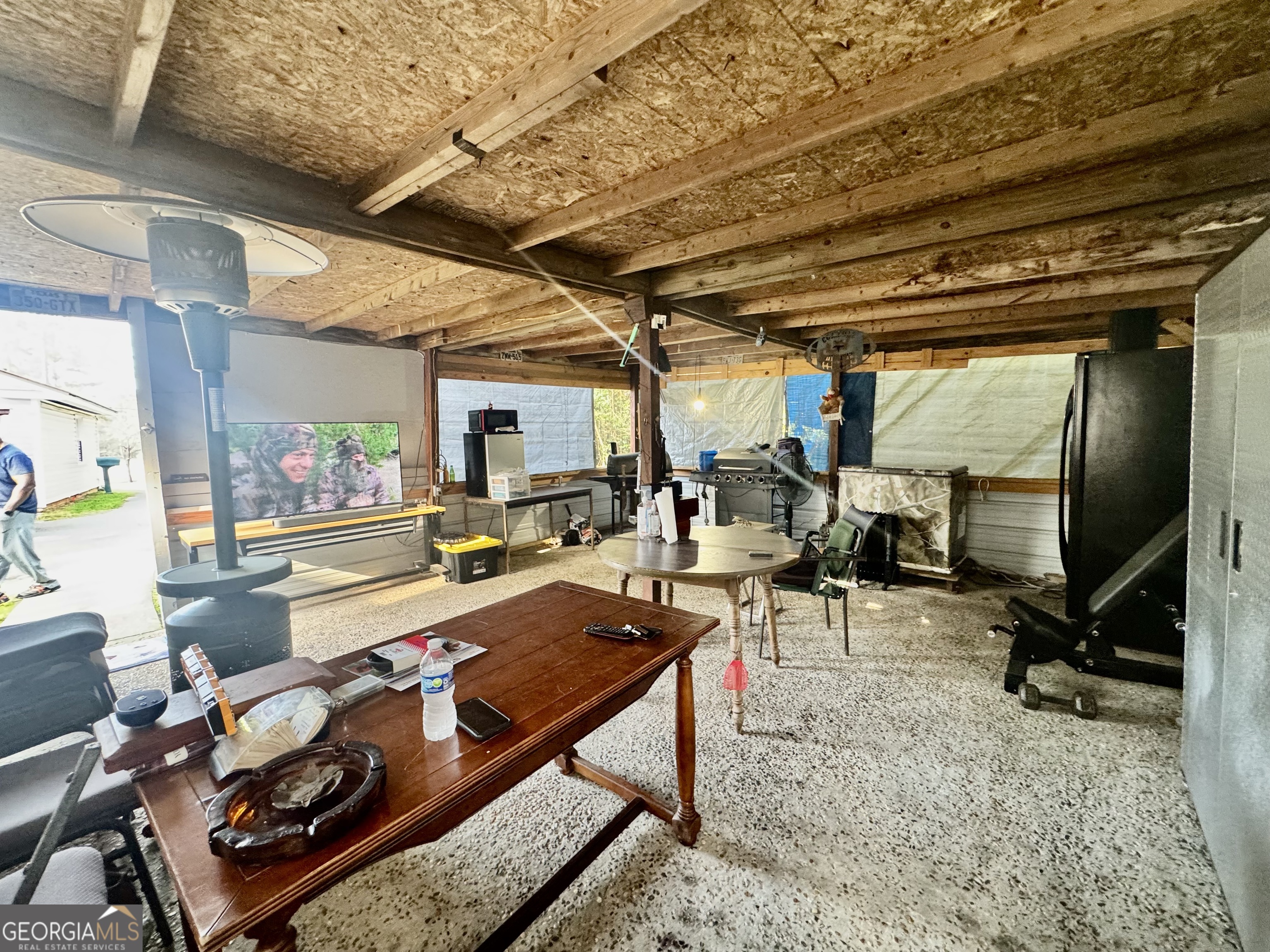 914 Adderton Street Americus, GA 31719 - Photo 49 of 54 a room with furniture and a large window