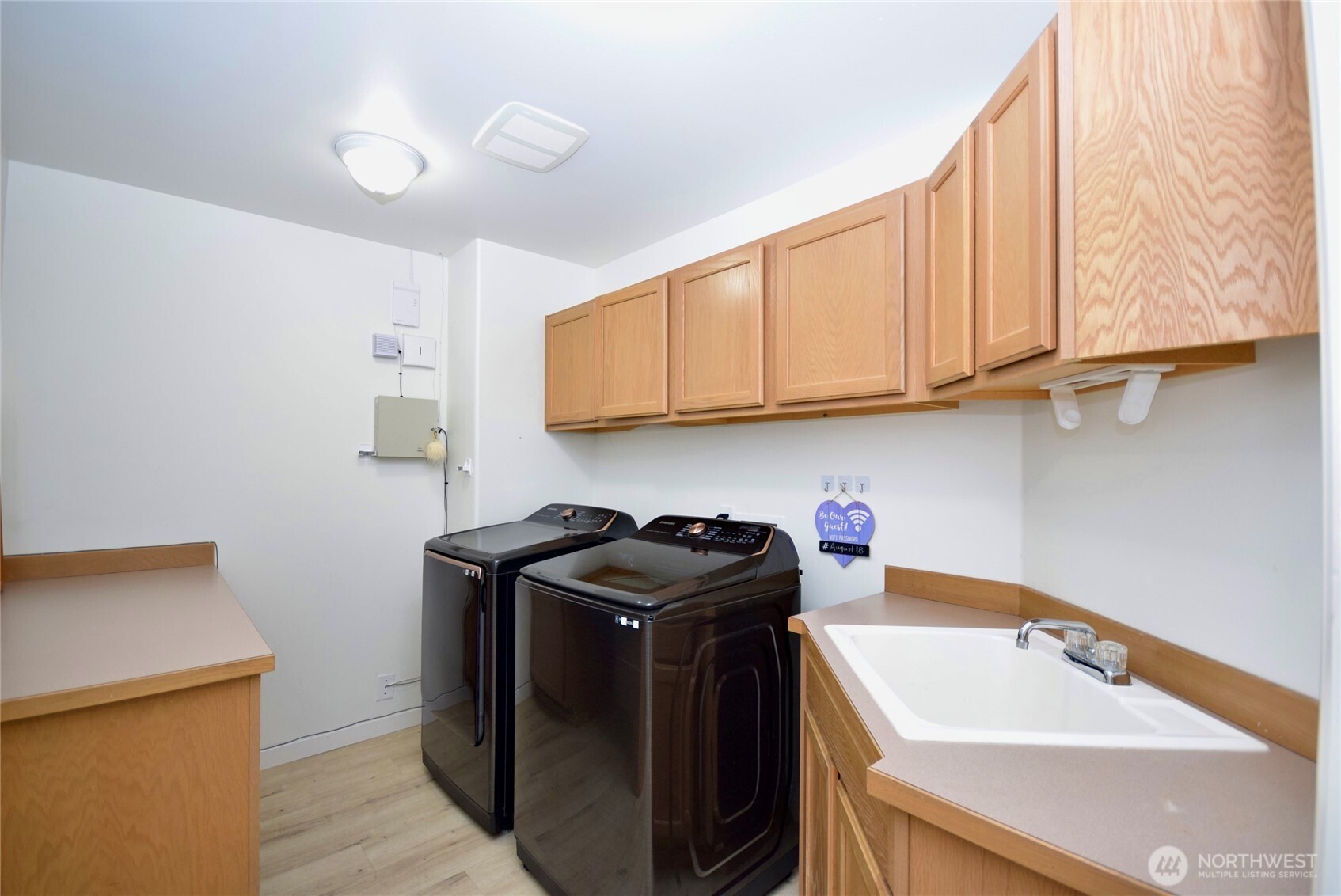 71 John Carl Road Sequim, WA 98382 - Photo 20 of 37 a utility room with sink dryer and washer
