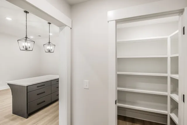 a view of a hallway with closet